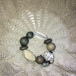 Bracelet made with wood beads and clear beads